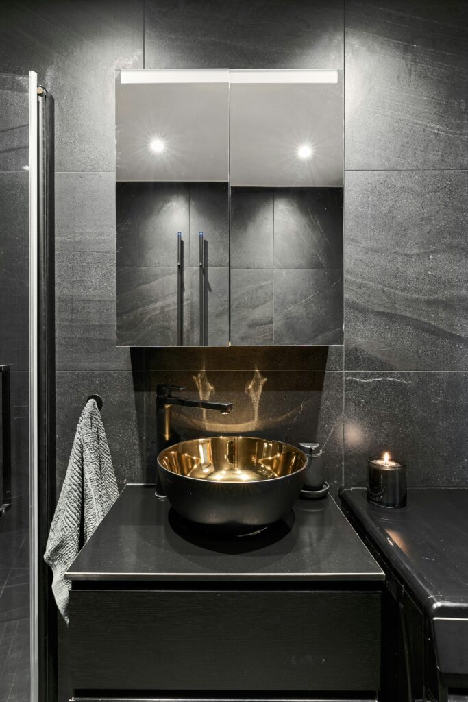 Luxury handcrafted Moroccan copper sink in a modern bathroom